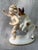 Vintage porcelain figurine of a young child and his goat playing. Made in Germany by Wallendorf, makers mark is on the...