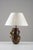Exceptional bronze table lamp originally crafted as a vase by french artist eugène provost (1836–1885). The vessel...