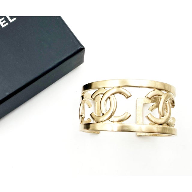Chanel Gold CC Frame Cuff * Marked 18 * Made in Italy * Comes with the original box -It is approximately 2.25" x 2", Cuff...