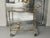 This elegant golden bar cart from 1881, exudes retro charm and timeless sophistication, perfect for elevating your...