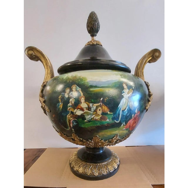 Antique pair of Italian marble urns with painted design on both sides and wood form bronze mounts has tessellated stone...