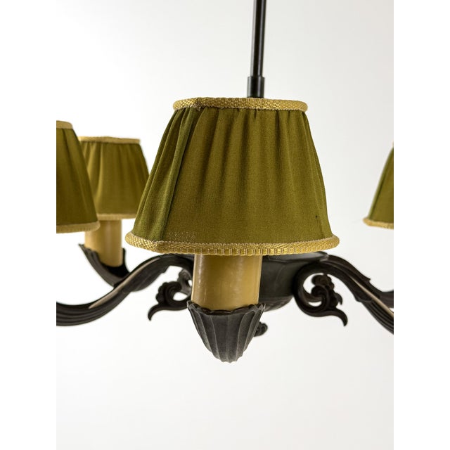 A refined swedish chandelier designed by harald notini for böhlmarks, one of sweden’s most distinguished lighting...