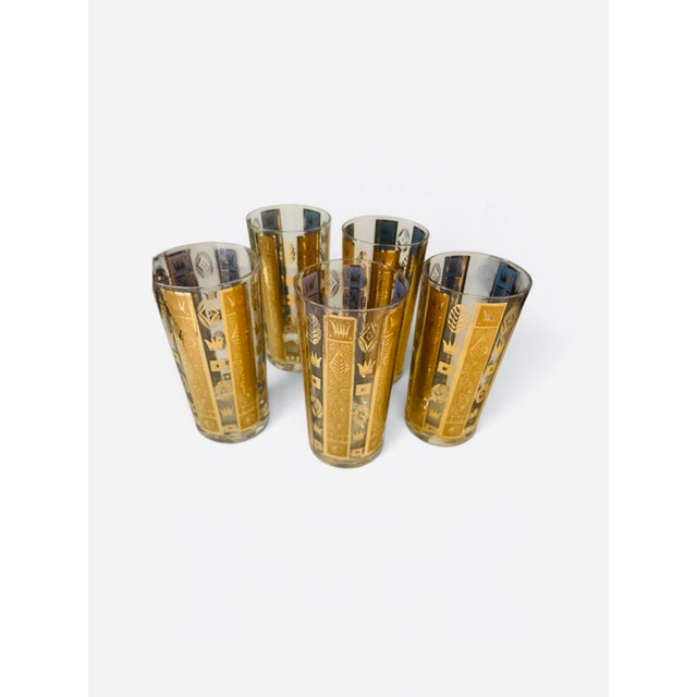 Elevate your bar cart with this stunning, authentic set of 5 vintage highball glasses by iconic mid-century designer...