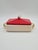 An original butter dish with an exceptionally elegant, geometric form. The body is made of cream-glazed ceramic, while the...