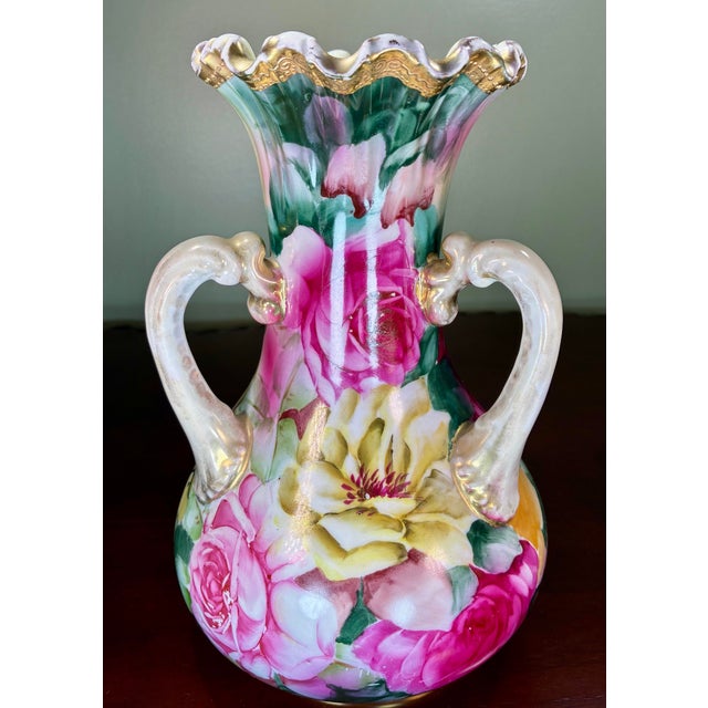 Detailed scene of hand-painted pink and yellow roses with gold gilding and highlights throughout. Unmarked.