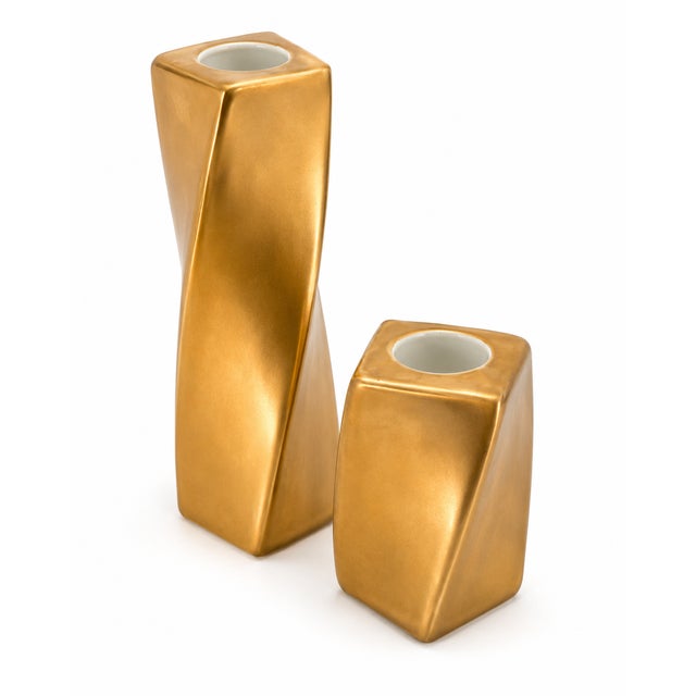 Rare elegant pair of sculptural candleholders designed by Angela Cummings for Arita, Japan, circa 1983. Crafted in fine...