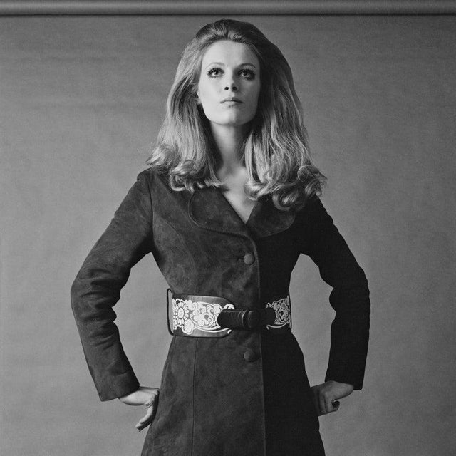 Fashion, 1960s A fashion model wearing a suede coat with decorated belt, UK, 24th February 1969. (Photo by Evening...