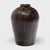 This large ceramic jar is a vintage Chinese wine vessel from the early 20th century, originally used for aging wine and...