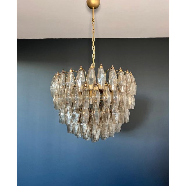 It sounds like you have a stunning piece of art with that Italian pendant light! The combination of 111 smoked Murano...