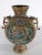 Vintage Chinese vase in brass, with traditional enameled pictorial motif. The vase has a disk form body, with brass...