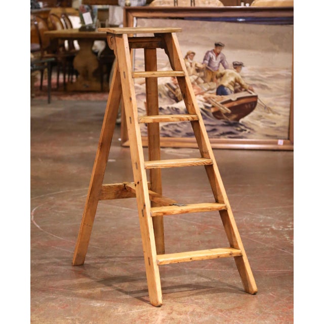 Crafted in France circa 1880, this antique folding ladder combines rustic charm with traditional craftsmanship. Built of...