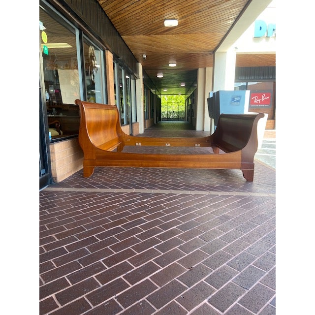 The Grange French Louis Philippe Cherry Wood King Size Sleigh Bed is a stunning piece of furniture that embodies elegance...