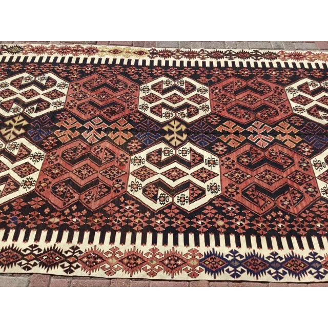 This beautiful, vintage, handwoven kilim is approximately 60 years old. It is handmade of wool and cotton in all natural...
