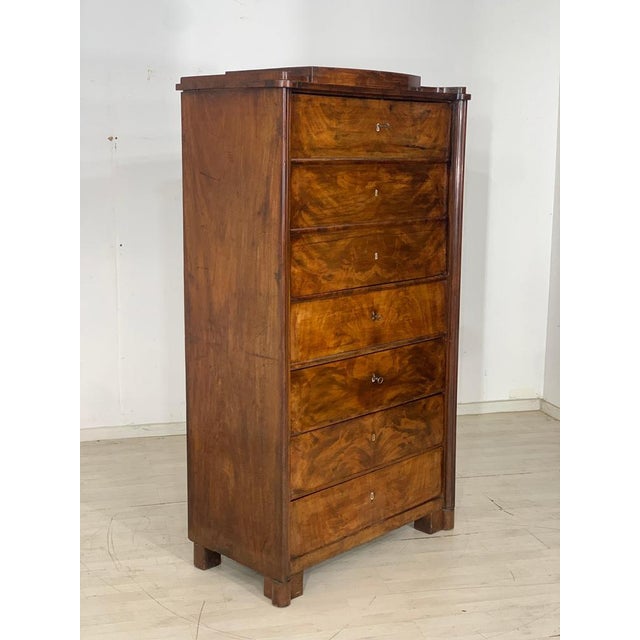 A very beautiful antique cabinet is for sale. The door and the penultimate compartment cannot be locked. A magnet was...