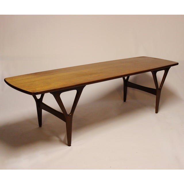 This Danish teak coffee table was designed in the 1960s.