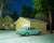 "Volvo Sky" is a dynamic C-Type print by Samuel Hicks. A turquoise pastel Volvo car sits quietly in the driveway of a...