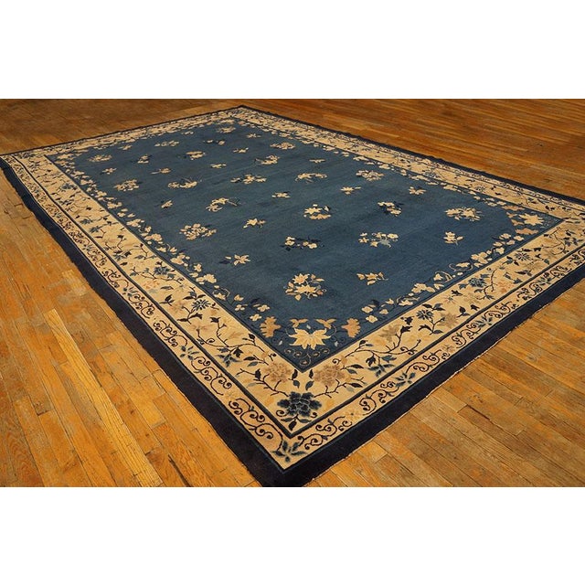 Antique Peking Chinese Floral Blue 1900s Blue Rug, Circa Date: 1900s. This exquisite Chinese Peking piece, dating from the...