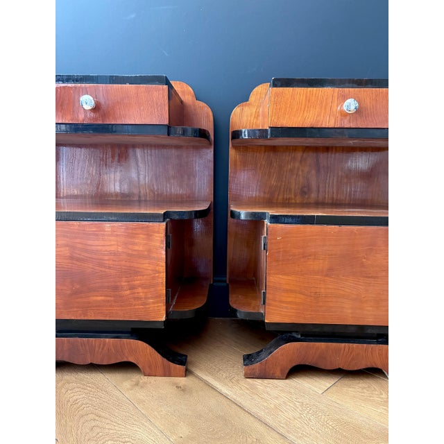 Pair of Art Deco style tables. Two drawers and two small, functional storage compartments. 1960s. In very good condition....