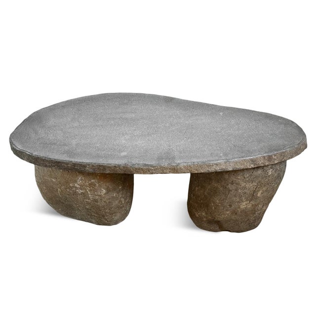 Solid heavy stone boulder outdoor coffee table or bench. Thick slab top and two boulder legs. Smooth polished top with...