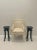 Superbly stylish pair of Maison Jansen-esque French ebonized square end tables having Asian pagoda flair, handsome carved...