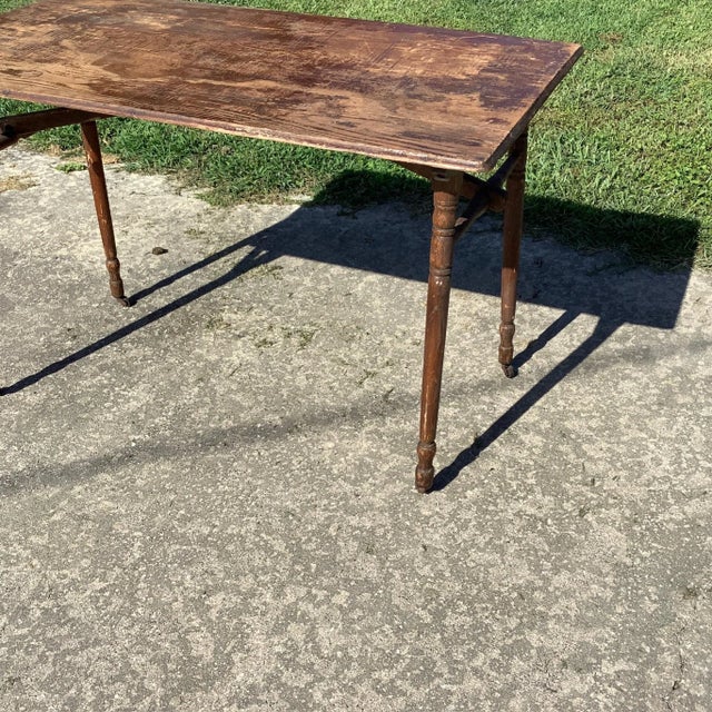 Antique Country Folding table. Perfect decorator item or put in use. Capture the rustic charm of generations long gone.
