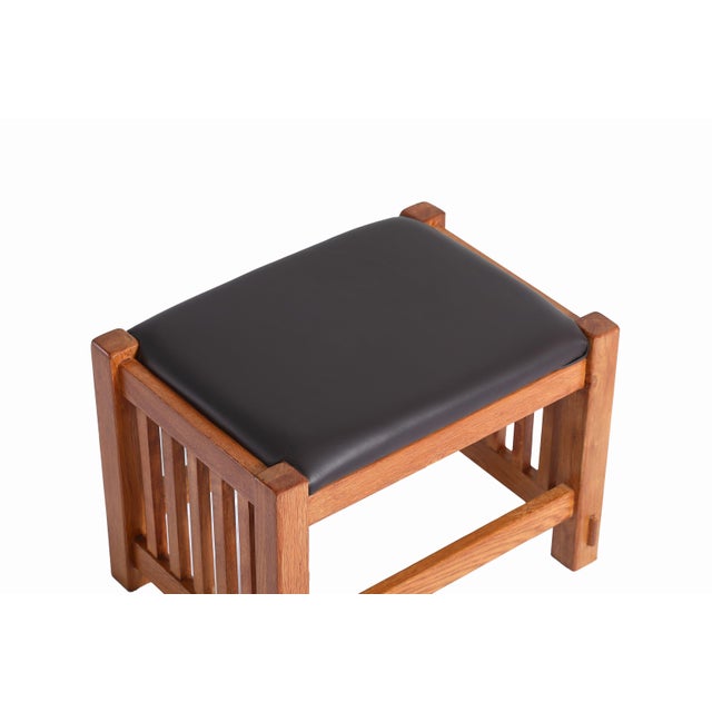 Bring timeless elegance to your home with the Mission Oak Foot Stool - Spindles. Crafted in the Mission / Arts Crafts...