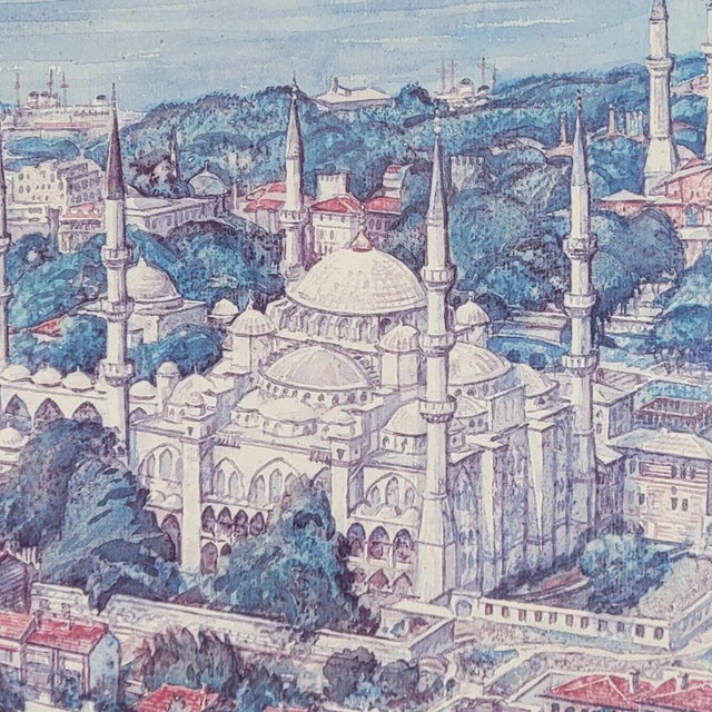 This is a beautifully framed and matted print of a watercolor painting of the Suleymaniye Mosque in Istanbul. The print...