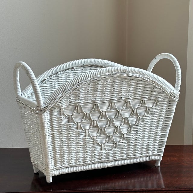 Offerning a lovely handcrafted wicker magazine/book holder from the mid-20th century. Love the detailed weave on this...