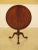 Baker Stately Homes Collection round tilt top mahogany table. Features ball and claw feet, fine carved Details and high...