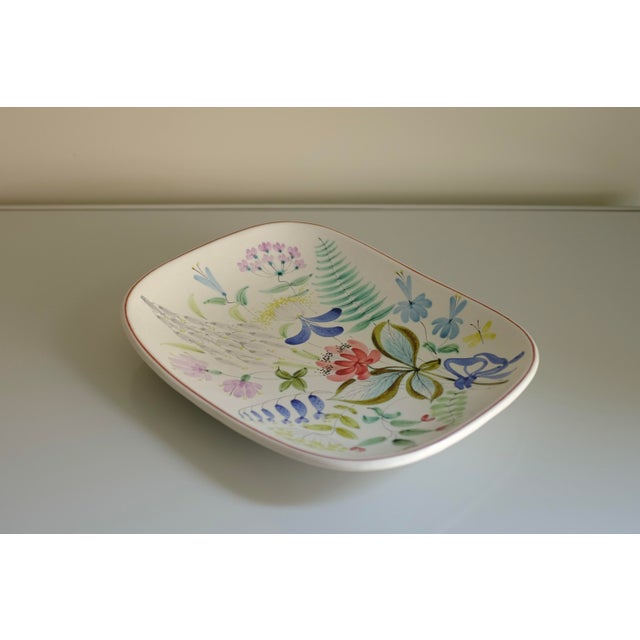 Stunning Large Faience Ceramic Plate by Stig Lindberg for Gustavsberg. Milky white ceramic featuring a selection of flower...