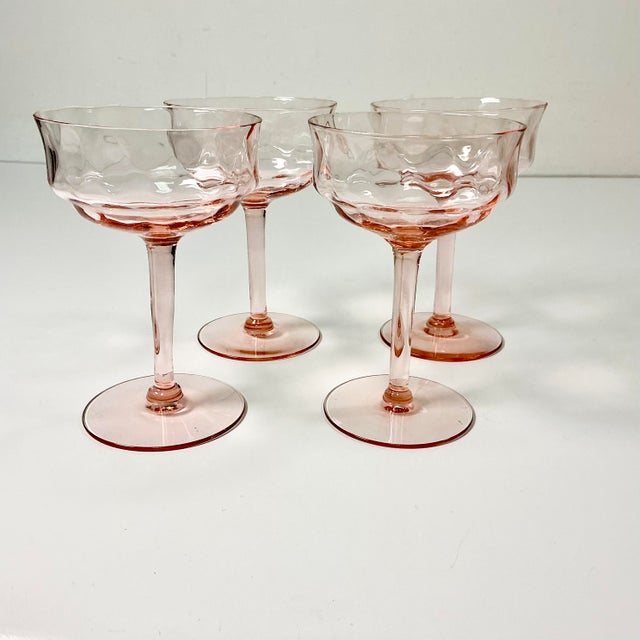 These are stunningly lovely. The set of 4 crystal Champagne Coupes are a beautiful pink so popular during the Art Deco era...