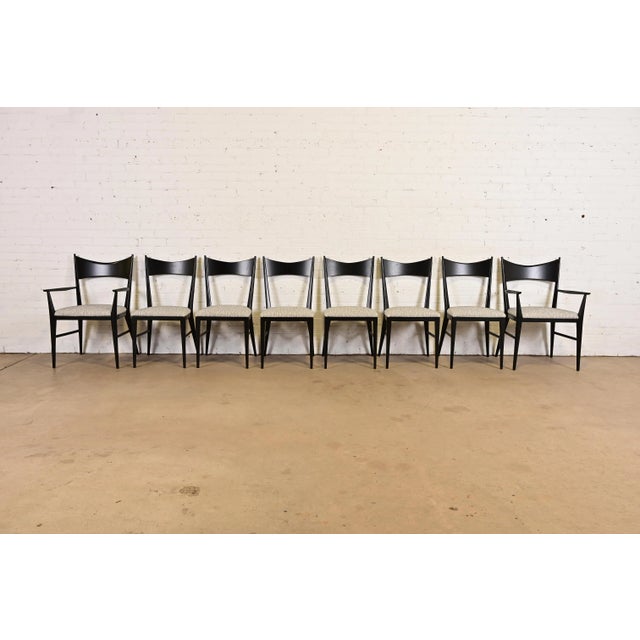 An exceptional set of eight Mid-Century Modern bow tie dining chairs By Paul McCobb for Directional and produced by Calvin...