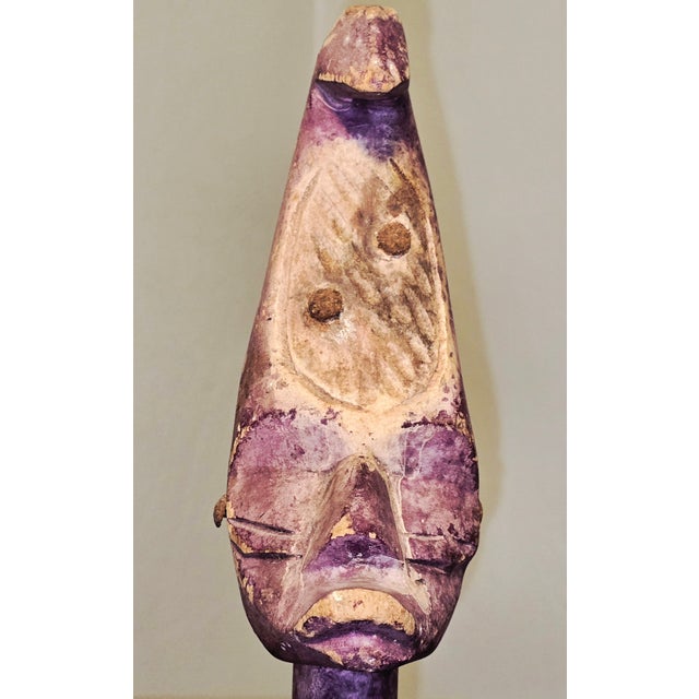 A compelling mid‑century Yina (Ina) spirit figure from the Abelam / Maprik region of Papua New Guinea, carved in an...