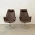 Dimensions: 26"w x 40"d x 40"; Seat: 16"h; Arm: 22"h Pair of Jetson lounge chairs by Bruno Mathsson with brown quilted...