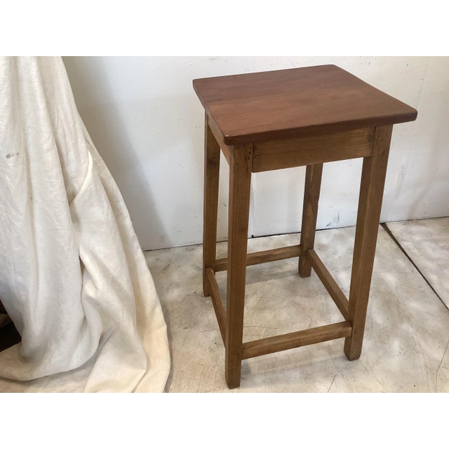 This simple hardwood stand is sturdy.