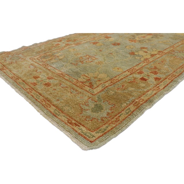 Contemporary Turkish Oushak Runner with Warm, Mediterranean Style. With its hues in harmony inspired by warm,...