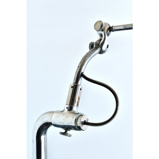 1940s Ritter dental machine arm reimagined as a floor lamp. 6 points of articulation makes this lamp a shape-shifter....