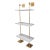 Modern multi-tier shelf in polished gold and white shelves, details urban simplicity with burnished finishes. Marais Shelf...