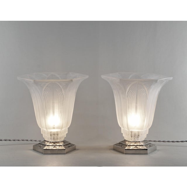 Pierre d'Avesn A rare pair of French 1930 art deco lamps in nickel plated solid brass or bronze holding beautiful,...