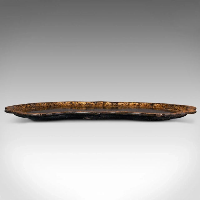 This is a large antique Chinoiserie serving tray. An Oriental, Japanned afternoon tea platter, dating to the late...