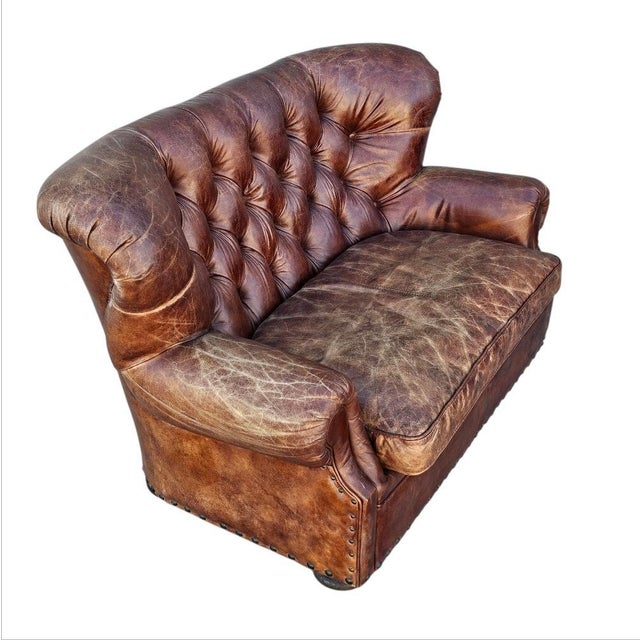 A very rare and hard to find since it is no longer in production. A 5-foot Leather Restoration Hardware Churchill Loveseat...