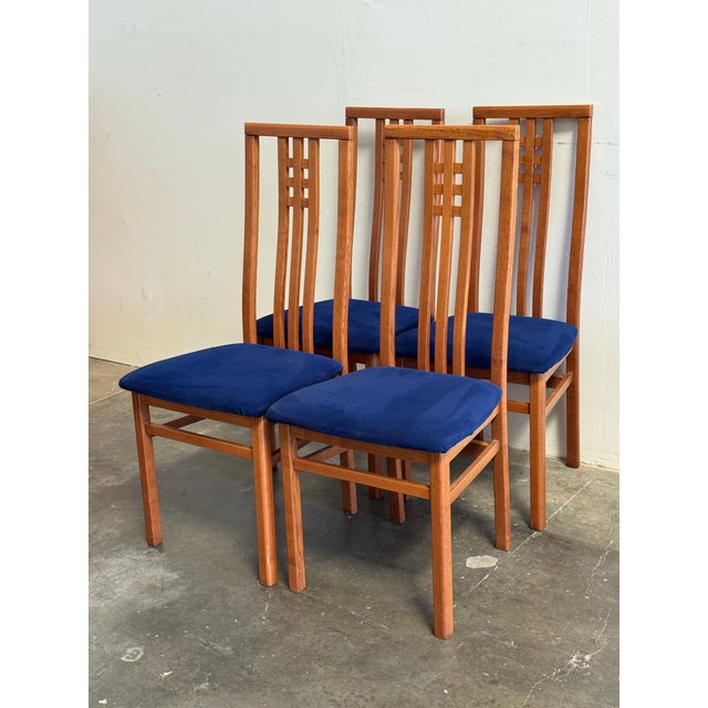 A stunning set of 4 high-back Italian dining chairs, expertly crafted by IMS SRL in Italy. These architecturally inspired...