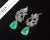 Gorgeous 18K solid gold and 900 platinum 23.23CTS diamond and Colombian emerald 2-in-1 cluster/dangle earrings. These are...