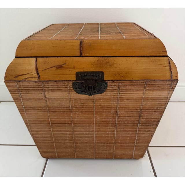 Great looking thick bamboo with pencil Reed wrapped rattan storage box with nice lid and two handles on the side. Can also...
