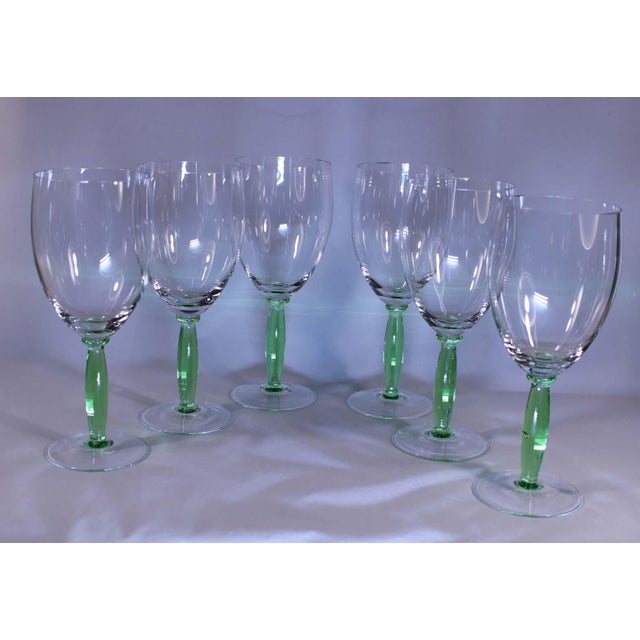 A beautiful and one of a kind set of 6 wine glasses. These were a part of a prototype production run, we were able to save...