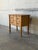 This charming small dresser features a compact rectangular profile elevated by classic turned legs. The distinctive design...