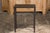 A narrow side table made of a Louis Vuitton leather top, mounted on a custom metal base. Step into a world of refined...