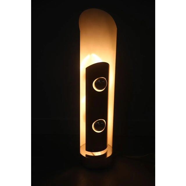 This table lamp was designed by Enrico Tronconi in the 1970s in the pop art style and was produced by Esperia in Italy in...