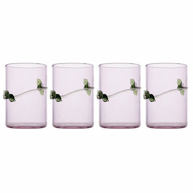 Imagine a delicate, hand blown glass revealing the touch of the artisan who shaped it. These charming glasses are adorned...