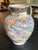 Unusual and colorful Kutani vase with beautiful floral design featuring cherry blossoms, chrysanthemums and birds. Gilt...